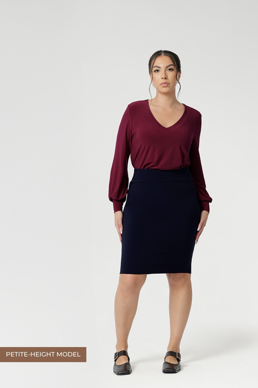 Petite height model wears double-layer tube skirt. Designed to ensure a flattering fit, while the soft folded waistband adds extra comfort. The Andi Tube Skirt is available in a mini length, regular and midi length for a bold and stylish look no matter your style.
