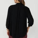 Crafted from a soft breathable Tencel Viscose fabric with a sand-washed texture and a soft drape. The fabric has no stretch.