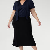 The Asher Skirt is your go-to for easy, elegant dressing. Made from our signature dry-touch stretch jersey, it offers a comfortable, flexible fit with a pull-on elastic waist and refined A-line silhouette. Designed for movement and all-day wear, this skirt transitions seamlessly from office to off-duty. Australian designed and made.