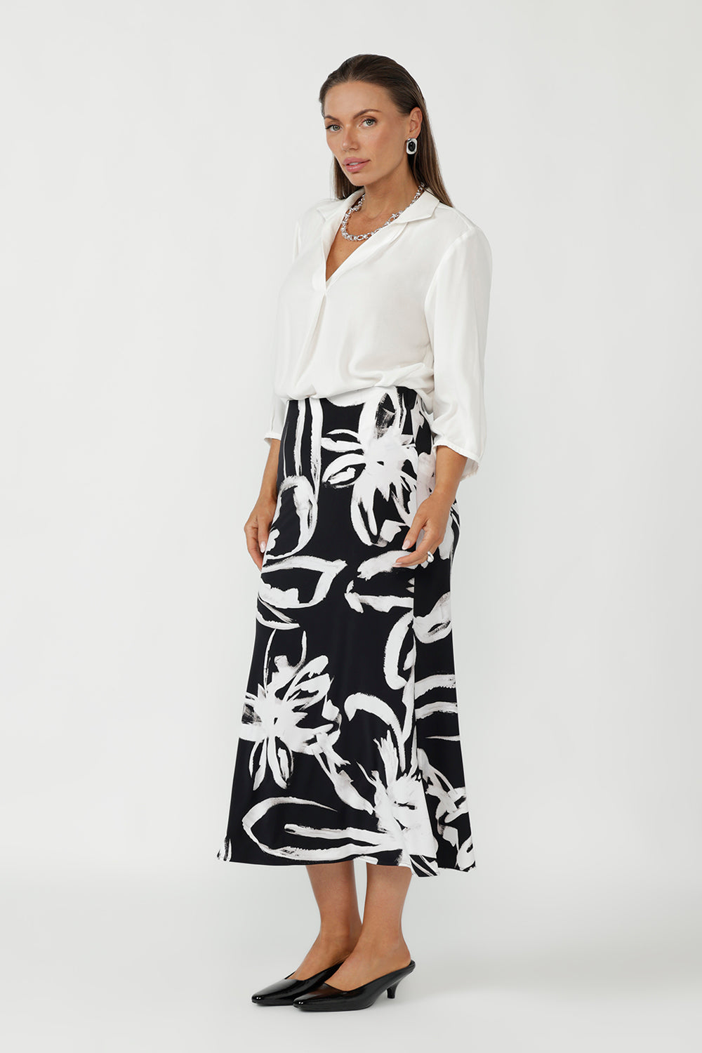 Designed with an easy pull-on elasticated waist and a flattering A-line silhouette - perfect for creating polished yet comfortable office wear looks.