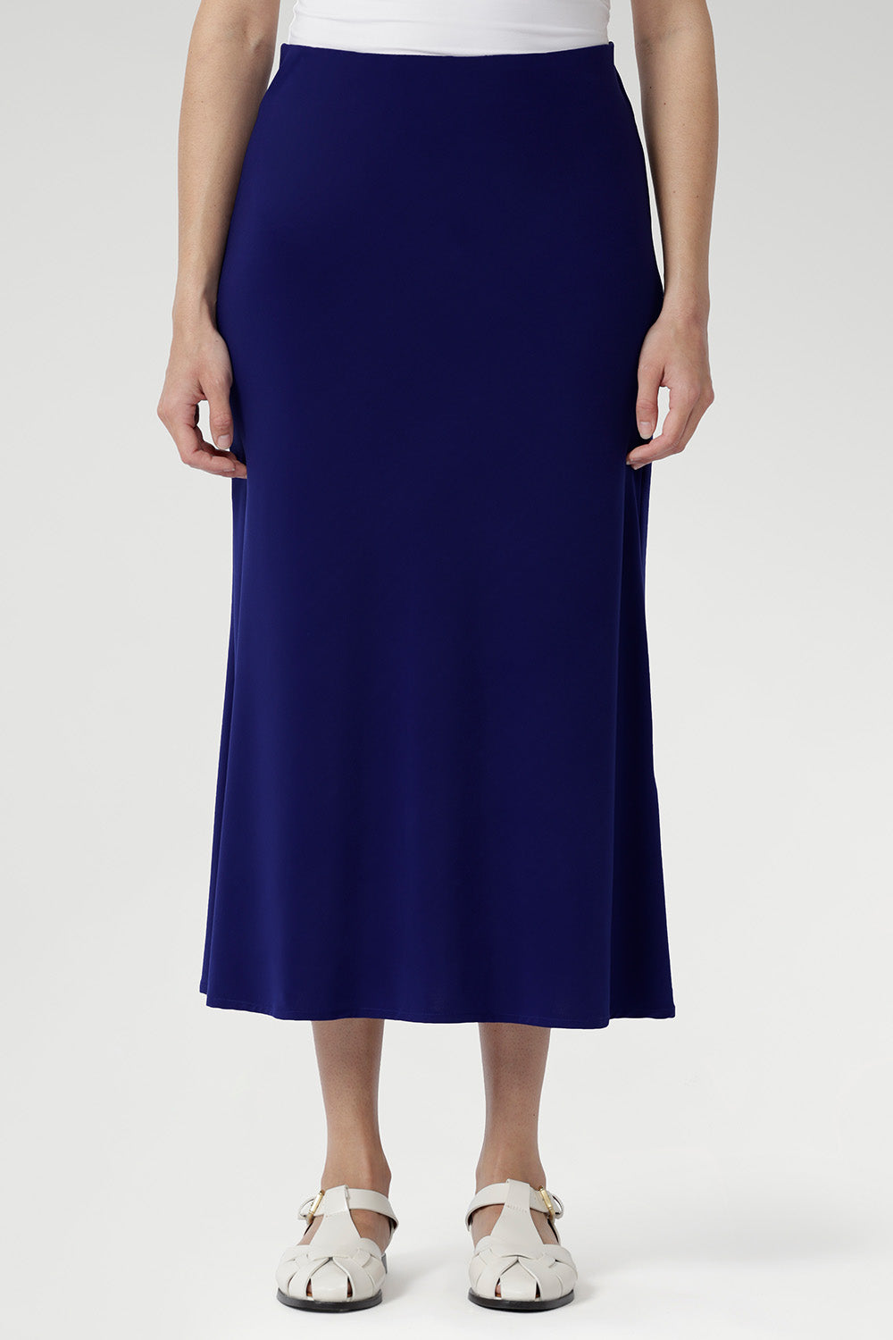 Pull-on style A-line skirt offers a flattering fit, smooth drape, and easy comfort — perfect for workdays, weekends, and everything in between.
