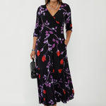 Crafted from our signature dry touch jersey, the Bettina Reversible Fixed Wrap Dress offers two looks in one dress, the perfect return on investment. 