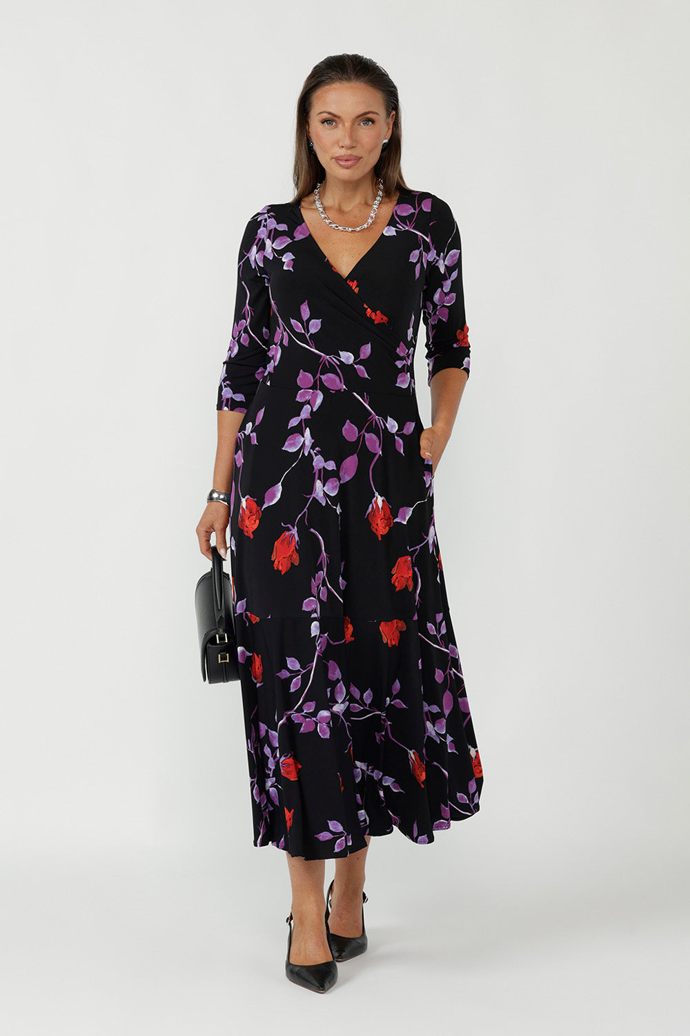 Crafted from our signature dry touch jersey, the Bettina Reversible Fixed Wrap Dress offers two looks in one dress, the perfect return on investment. 