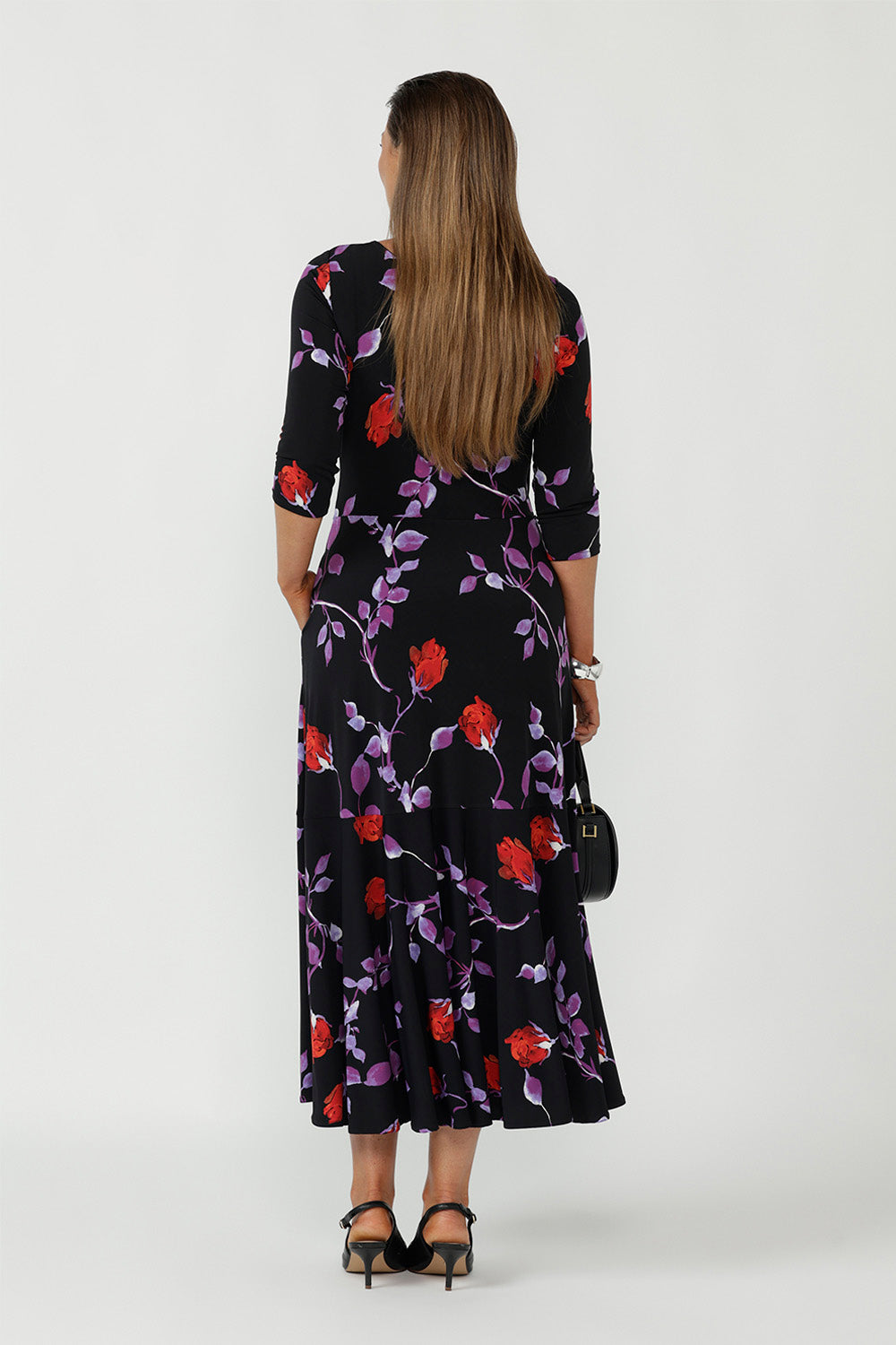 Featuring a wrap V-neckline on one side and a refined boat neck on the other, it’s designed with comfort, adaptability, and movement in mind.
