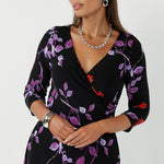 Crafted from our signature dry touch stretch jersey, the Bettina Wrap Dress is a fixed wrap style designed for comfort, movement, and all-day wear. 