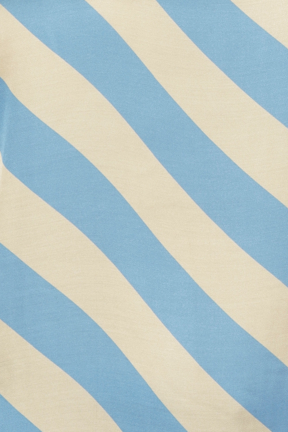 Blue Sky Stripe print Swatch. Crafted from premium Italian viscose in a smooth sateen weave, offering a lightweight feel with a silky touch against the skin. Garments in this collection are featured in sizes 8-24.