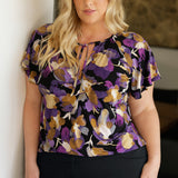 For everyday elegance the Bowie Top—a beautifully designed wardrobe essential that blends comfort, style, and versatility in one effortless piece. Crafted from our signature dry-touch stretch jersey, this top features a flattering V-neckline with delicate fabric ties that can be worn open for a relaxed look or tied for a touch of vintage charm.