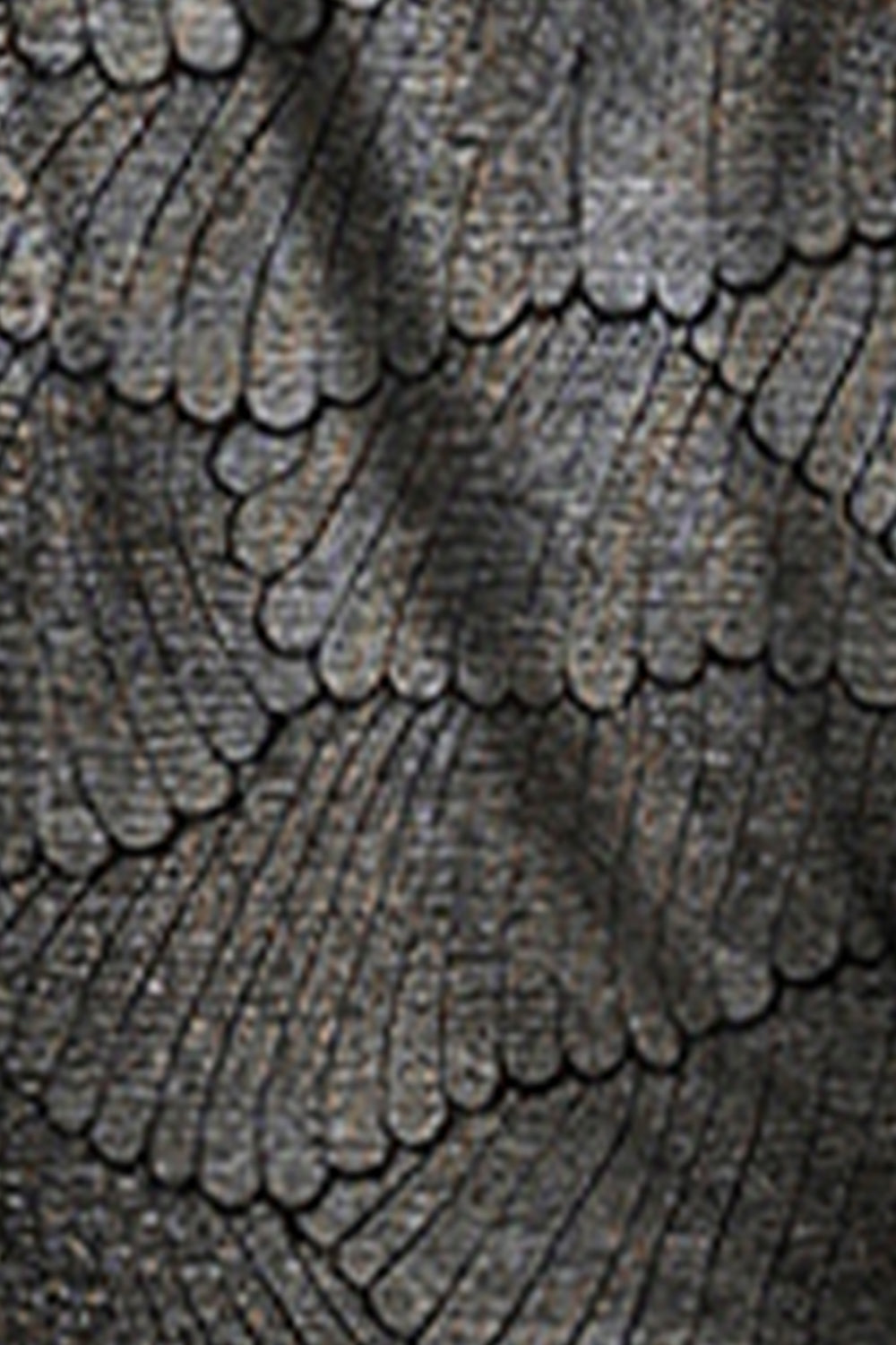 Fabric swatch of bronze foil scallop print fabric used Australian fashion brand to make skirts, top and dresses for cocktail wear.