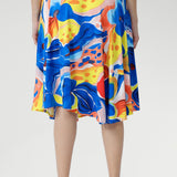 The Casey Dress in Summer Bliss captures effortless sophistication. Crafted from our slinky jersey with a smooth, cooling touch and gentle stretch, it features a graceful cowl neckline, blouson bodice, and asymmetrical hem. Shoulder-tucked sleeves and a statement floral print complete this lightweight piece. Ideal for holidays, relaxed weekends, and balmy summer afternoons. Australian made in sizes 8–24.