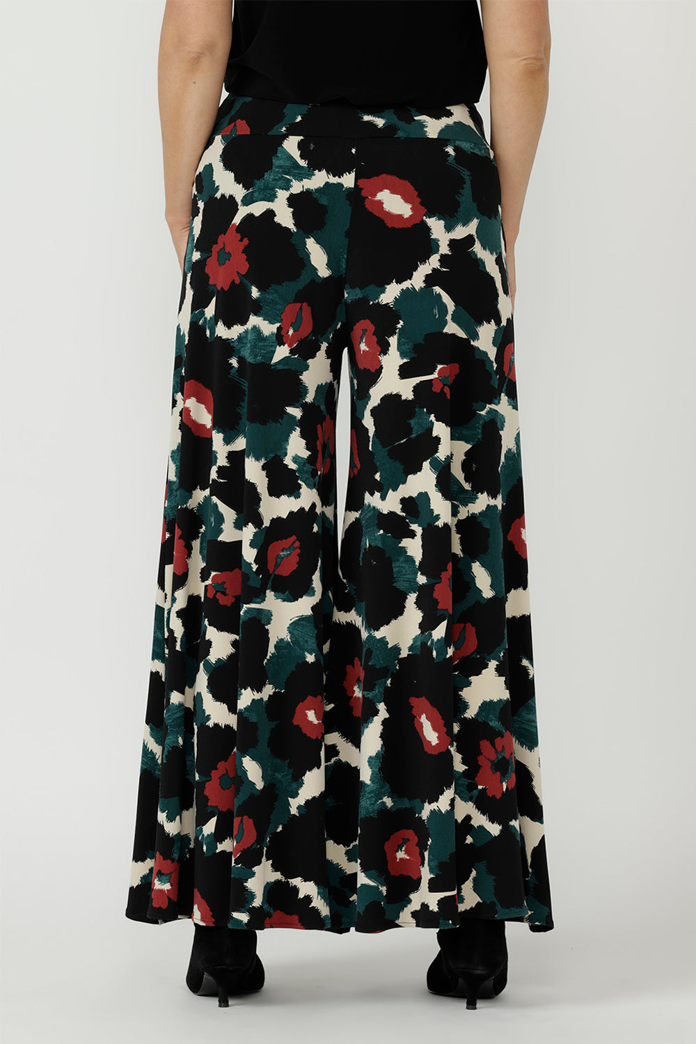 Travel-friendly Caspian Palazzo Pant in wrinkle-resistant stretch jersey, designed with flowing wide legs, a comfortable pull-on waistband and practical pockets.