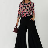Caspian Palazzo Pant crafted from premium dry-touch stretch jersey with a fluid wide-leg silhouette, pull-on waistband and side pockets for effortless everyday comfort.