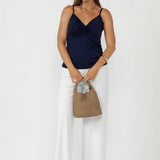 The Cleo Cami blends comfort and style, making it a go-to for women’s workwear and elevated basics. Crafted from soft stretch jersey with a V-neckline and scoop back, it’s designed for all-day wear and effortless layering