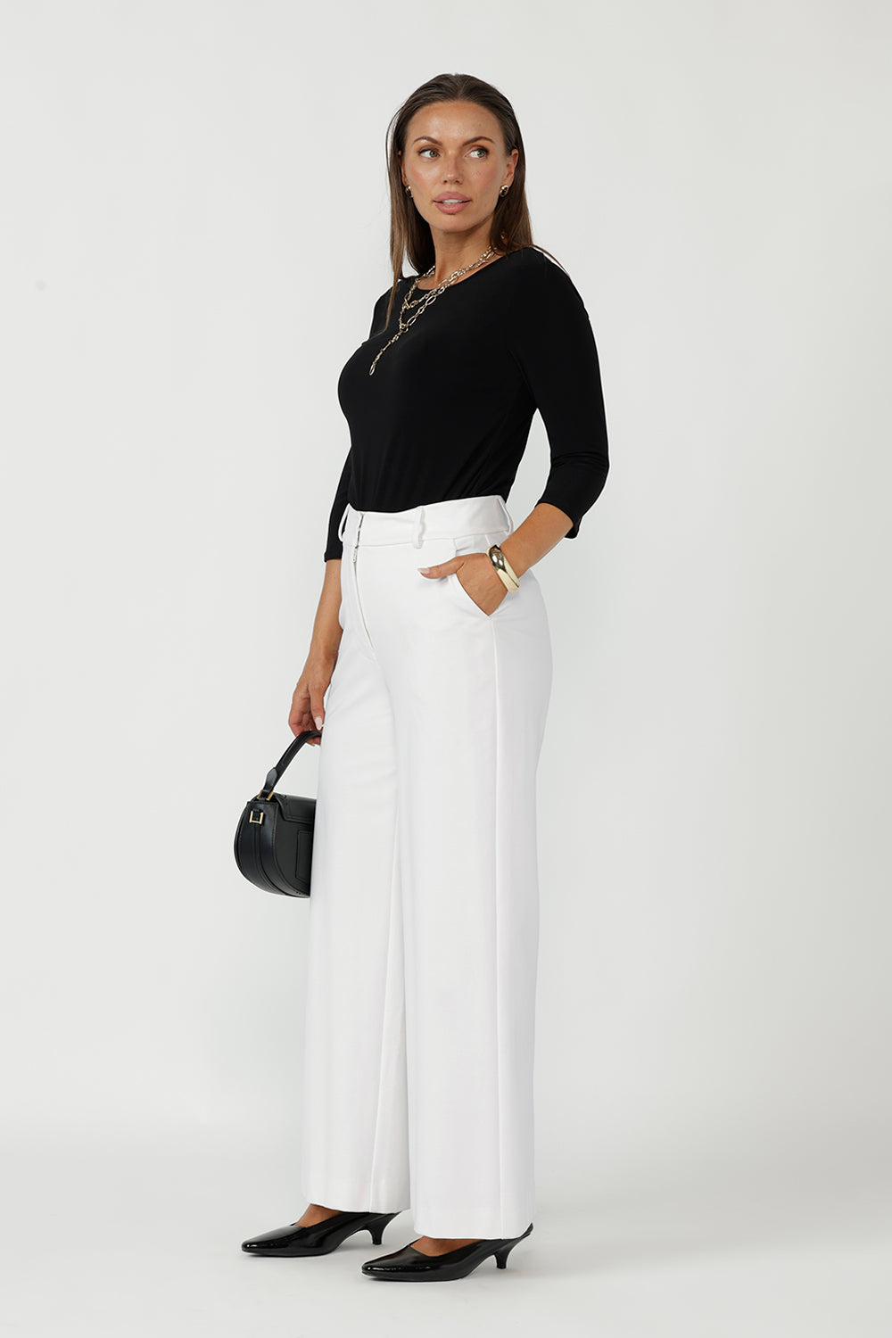 Australian-made Collins Top with a polished boat-neck design, soft dipped hemline and comfortable stretch jersey for elevated everyday wear.