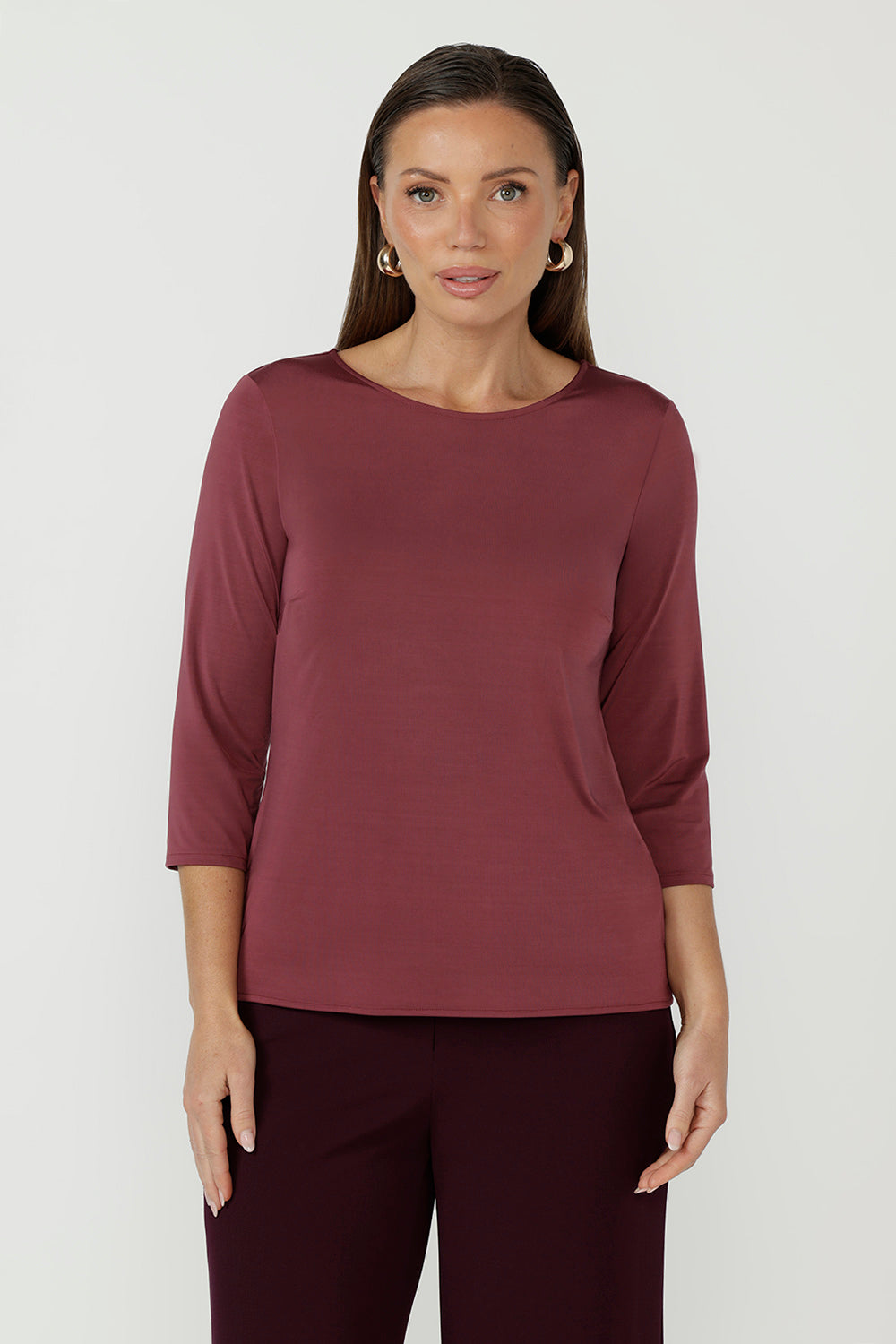 Chic boat neckline top with streamlined design, this top will quickly become your go-to piece for effortless style.
