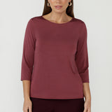 Chic boat neckline top with streamlined design, this top will quickly become your go-to piece for effortless style.