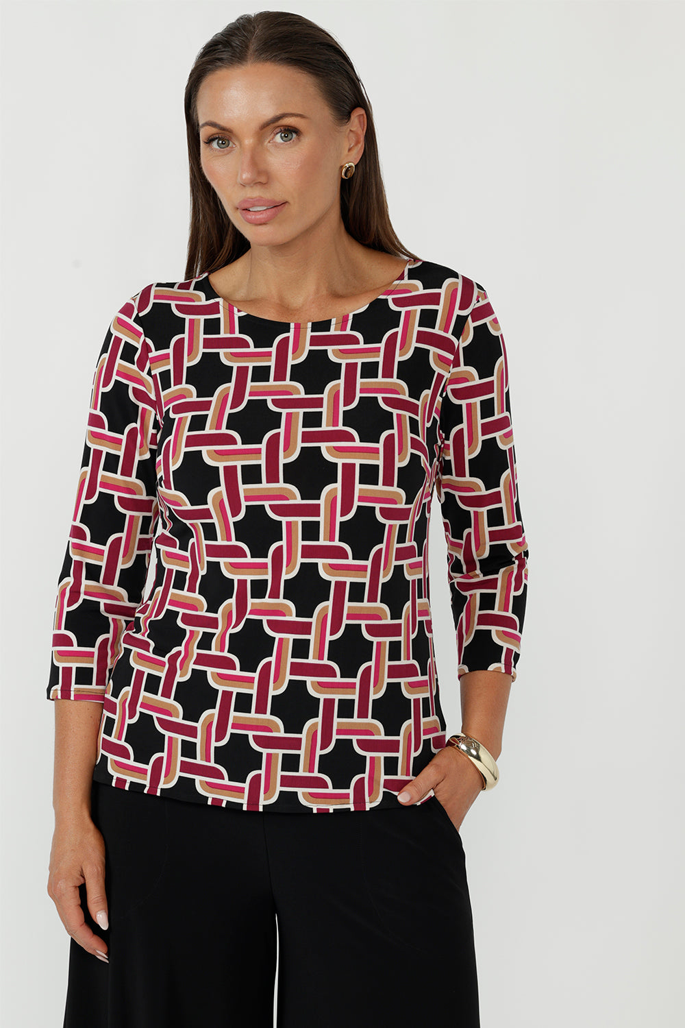 Women’s Collins Top in the Ruby Connection print with a flattering close-to-body fit, boat neckline, dipped hemline and soft stretch jersey, proudly made in Australia.