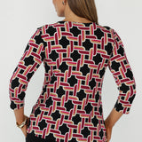 Australian-made Collins Top in the Ruby Connection print with soft stretch fabrication, streamlined fit, dipped hemline and modern geometric detailing for effortless everyday dressing.
