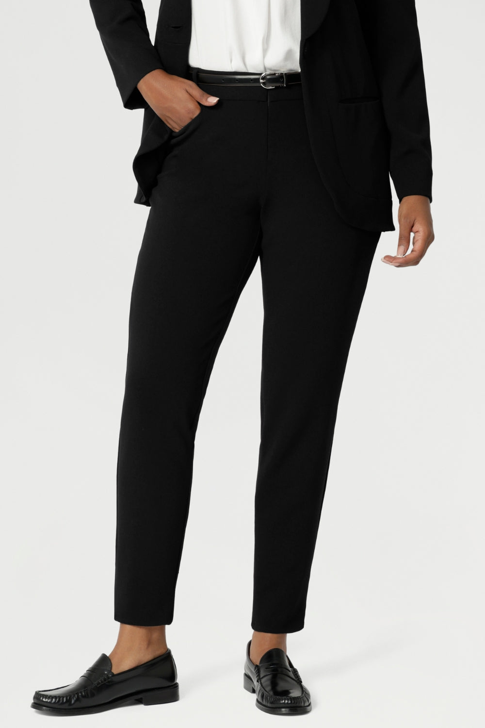 Easy care pants are made from scuba crepe fabric that provide comfortability and stretch when worn. Image shows pants styled with blazer for a full suiting look. Woman's clothing brand Leina & Fleur is Australian made and have a size offering of 8-24.