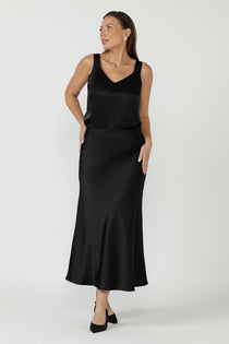 Crafted from a luxurious satin fabric with a high shine finish, the Manhattan Maxi Skirt in Black Satin brings modern elegance to after-dark dressing.
