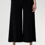 Black pants have a smooth waistband, side pockets and are pull-on pants made in stretch jersey. Made in Australia, the pants are size inclusive in sizes 8 - 24.