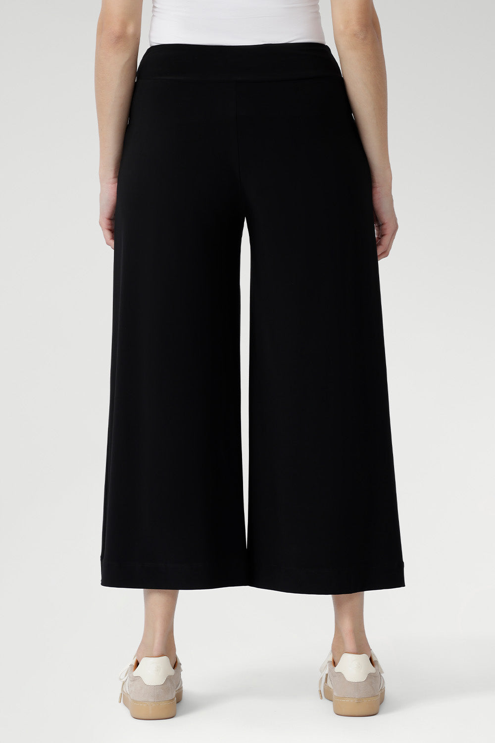 Black pants have a smooth waistband, side pockets and are pull-on pants made in stretch jersey. Made in Australia, the pants are size inclusive in sizes 8 - 24.