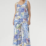 Designed with V-necklines front and back, wide straps for perfect bra coverage, and a shirttail hem, it’s finished with a Sicilian-inspired mosaic print. A versatile piece that brings effortless polish from work to weekend.