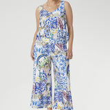 Designed with V-necklines front and back, wide straps for perfect bra coverage, and a shirttail hem, it’s finished with a Sicilian-inspired mosaic print. A versatile piece that brings effortless polish from work to weekend.