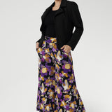 The extra-wide leg creates a flowing silhouette, while the cropped length and deep hemlines add modern flair. Designed with a double-layer pull-on waistband and functional side pockets with chic visible stitching, the Dany Culotte blends fashion and function seamlessly.