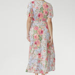 houghtfully finished with practical side pockets and a double-layered back bodice for structure and coverage, this maxi wrap dress is both polished and wearable. 