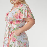 Crafted from our signature slinky jersey, the Delaney Dress in Powder Bloom is a timeless wrap dress that beautifully blends comfort and elegance. Designed to flatter, it drapes effortlessly over the body, offering a soft stretch that moves with you from day to evening.