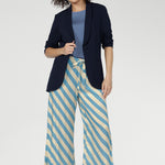 Functional side pockets add everyday practicality, while subtle hem slits enhance movement and flow. Pair back with Merit Blazer for a polished look