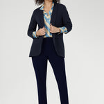 The Ellis Shirt is crafted from luxurious Italian viscose in a smooth sateen weave, offering a silky, fluid drape that moves beautifully on the body. 