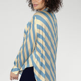 Designed as a refined oversized shirt, it transitions seamlessly from workdays to elevated events.