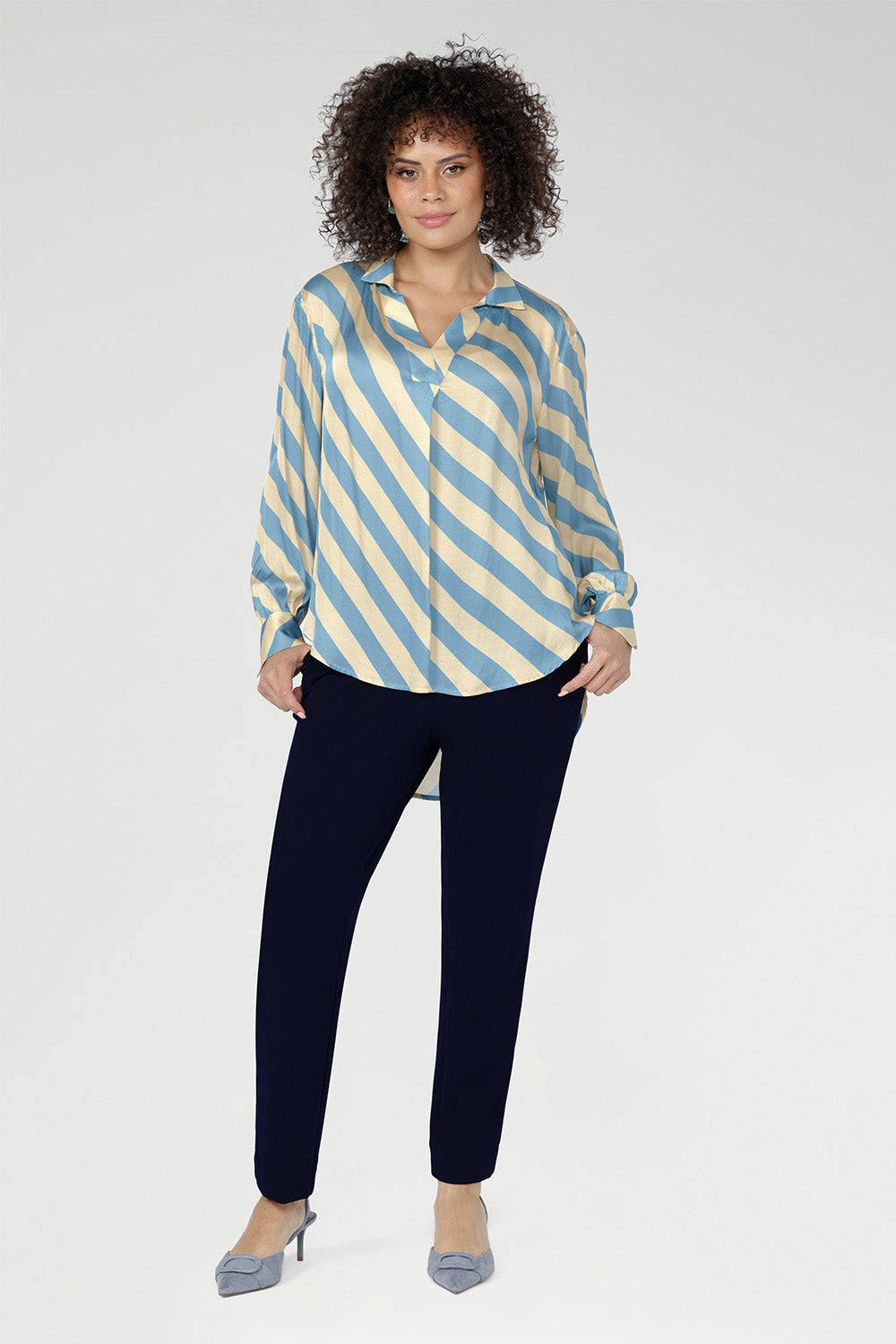 The diagonal stripe design enhances movement and visual interest, making it a standout piece for modern wardrobes.