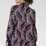 Ellis features an oversized fit that drapes beautifully and can be worn loose or styled with a front tuck for a more defined shape.