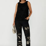 Gilded Noir Pant crafted from luxe winter-weight jacquard knit with soft stretch, featuring a textured black base with elegant toffee and cream print detailing and a flattering bootcut silhouette.