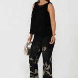 Women's Gilded Noir Pant in a premium stretch jacquard knit, designed with a comfortable pull-on waist, angled front pockets and a sophisticated full-length bootcut leg.