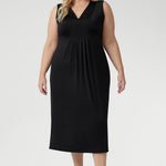 Australian-made Fernanda Dress in Black featuring soft stretch fabric, side splits, and cool-touch comfort for effortless summer style.