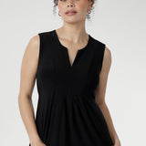 Cool-touch slinky Fernanda Dress in Black, a timeless midi sundress with front pleats, side splits, and effortless summer appeal.