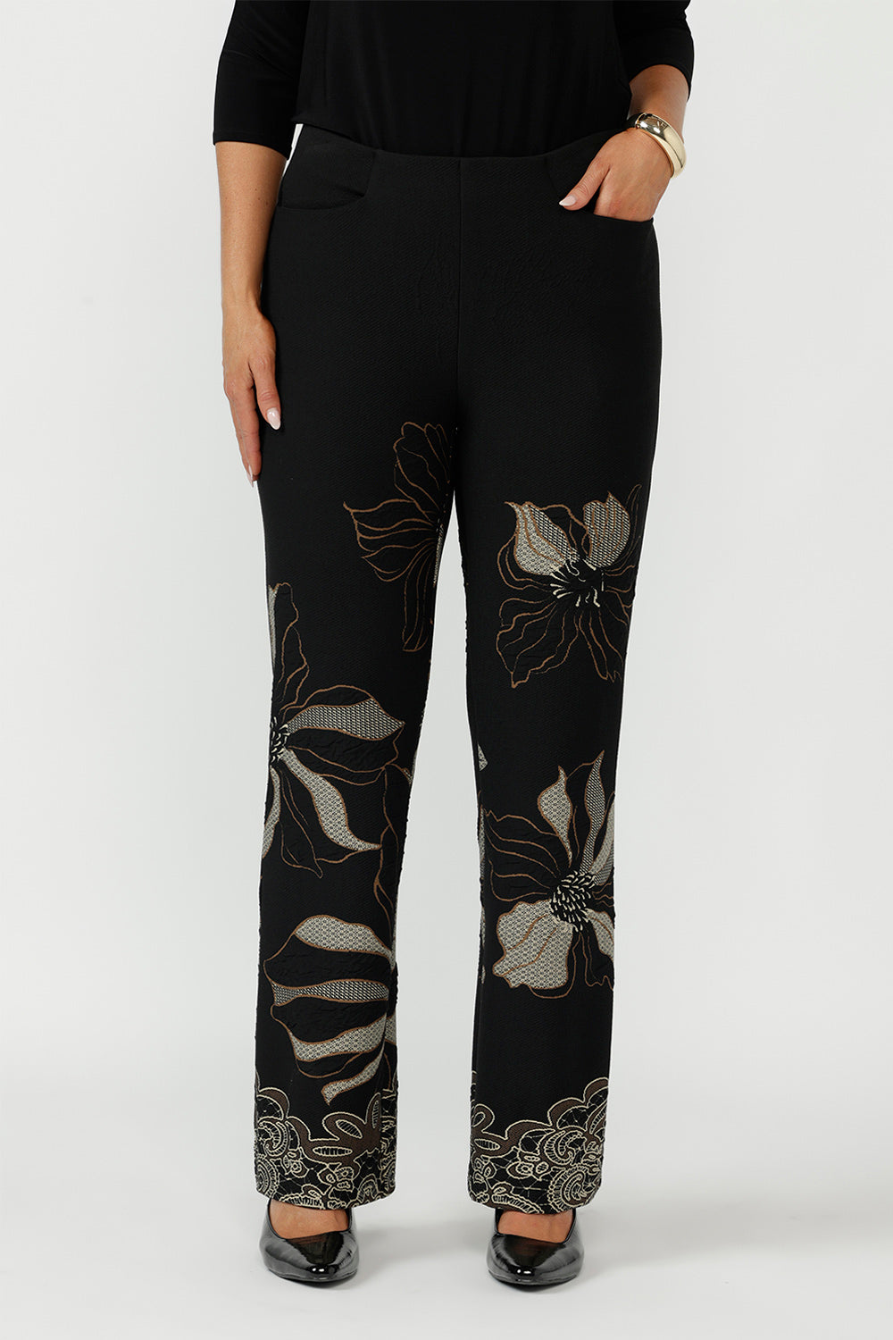 Elegant Gilded Noir pull-on pant crafted from winter-weight stretch jacquard knit with a mid-rise fit, angled pockets and a subtle bootcut flare for timeless style.