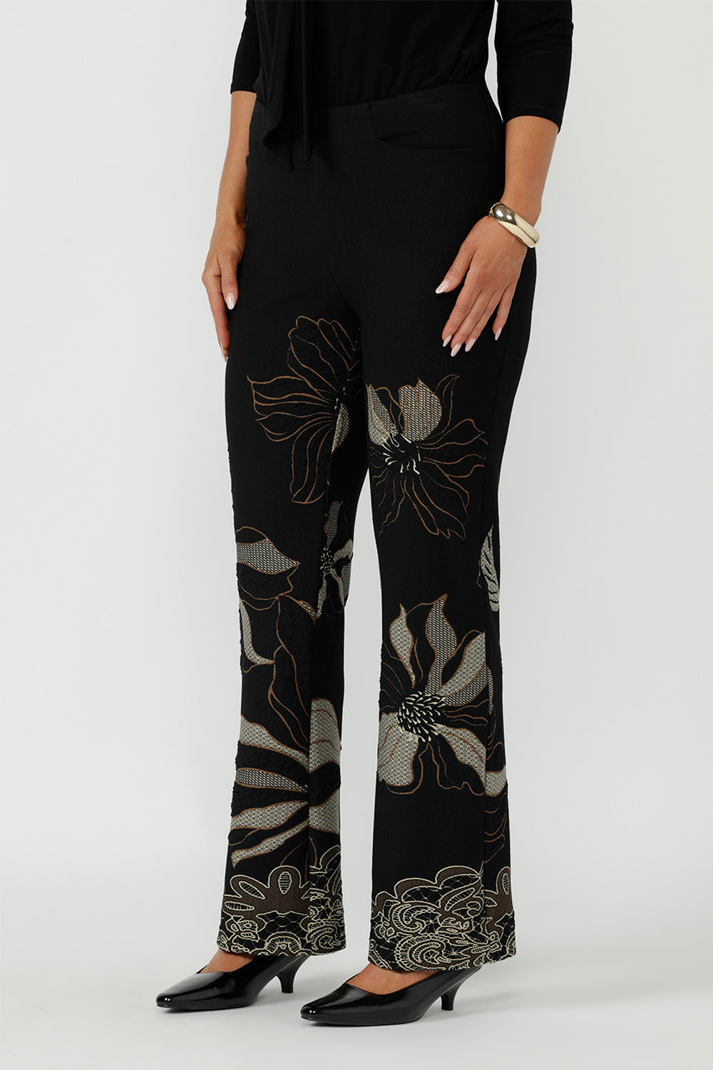 Luxe Gilded Noir Pant in a soft stretch jacquard knit with a flattering mid-rise waist, refined bootcut leg and statement textured print for modern occasion wear.