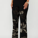 Luxe Gilded Noir Pant in a soft stretch jacquard knit with a flattering mid-rise waist, refined bootcut leg and statement textured print for modern occasion wear.