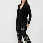 Elegant Gilded Noir pull-on pant crafted from winter-weight stretch jacquard knit with a mid-rise fit, angled pockets and a subtle bootcut flare for timeless style.