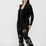 Elegant Gilded Noir pull-on pant crafted from winter-weight stretch jacquard knit with a mid-rise fit, angled pockets and a subtle bootcut flare for timeless style.