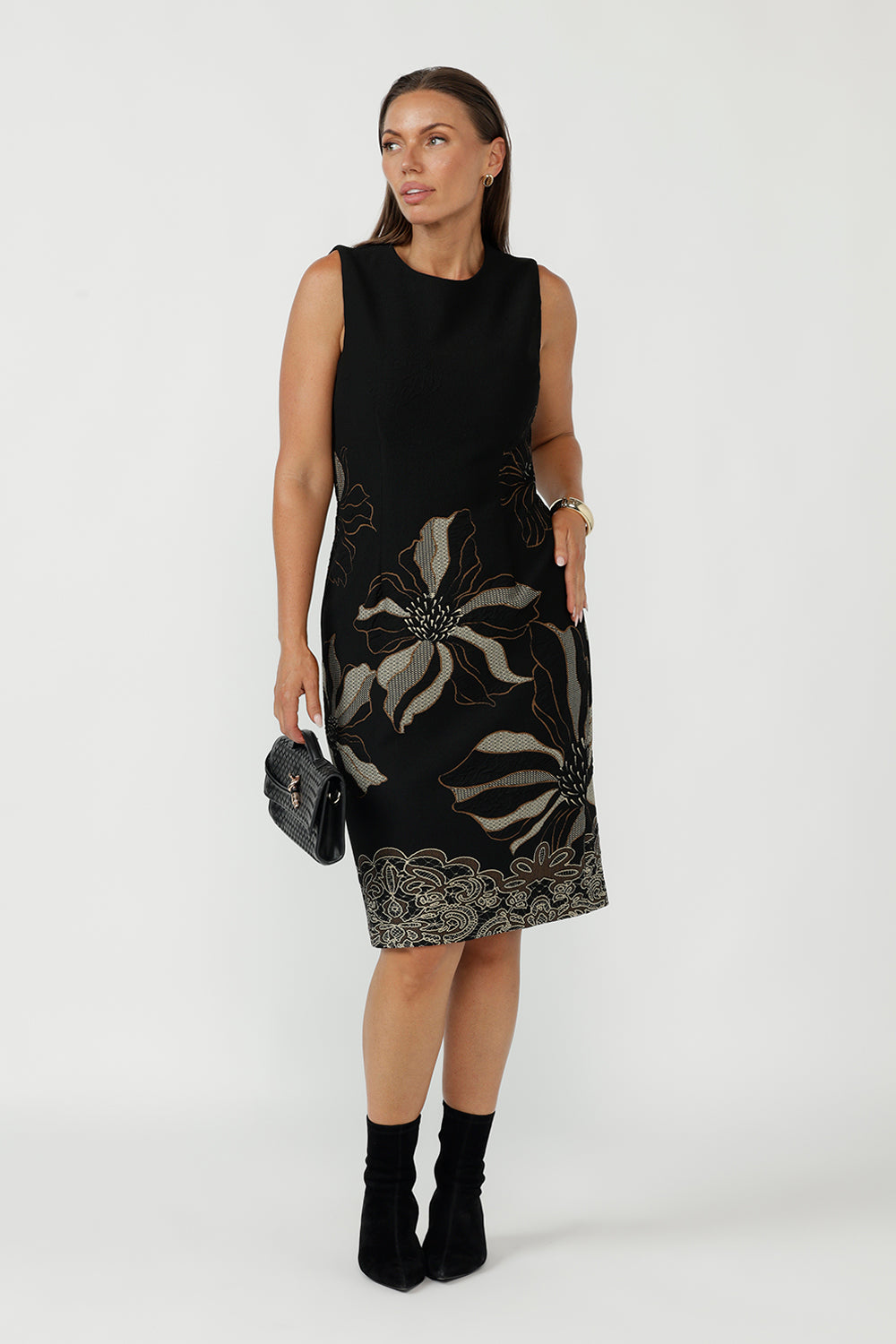 Sleeveless Gilded Noir Shift Dress in a premium textured jacquard knit, designed with flattering shaping darts, a refined neckline and an elegant black, toffee and cream print.
