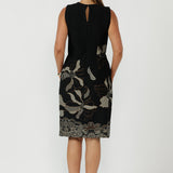 Elegant sleeveless shift dress from the Gilded Noir Collection, crafted from winter-weight jacquard knit with a flattering tailored fit, keyhole back detail and invisible zip closure.