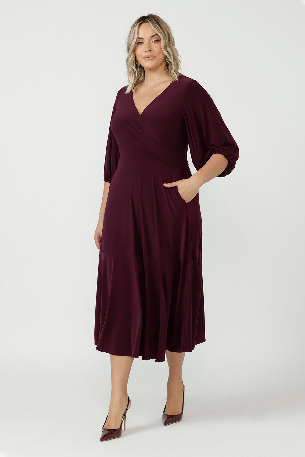 Women's Helena Dress in soft stretch jersey with a flattering V-neck wrap front, statement lantern sleeves and graceful maxi-length movement.