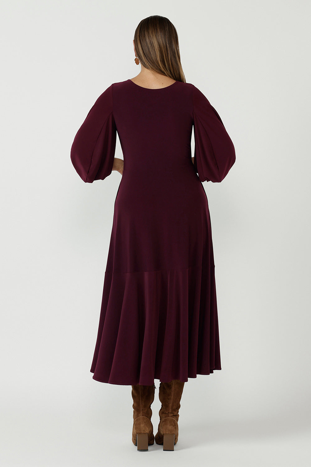 Timeless Helena Dress featuring a flowing maxi silhouette, ruffle hem detailing, side pockets and premium Australian-made stretch jersey construction.