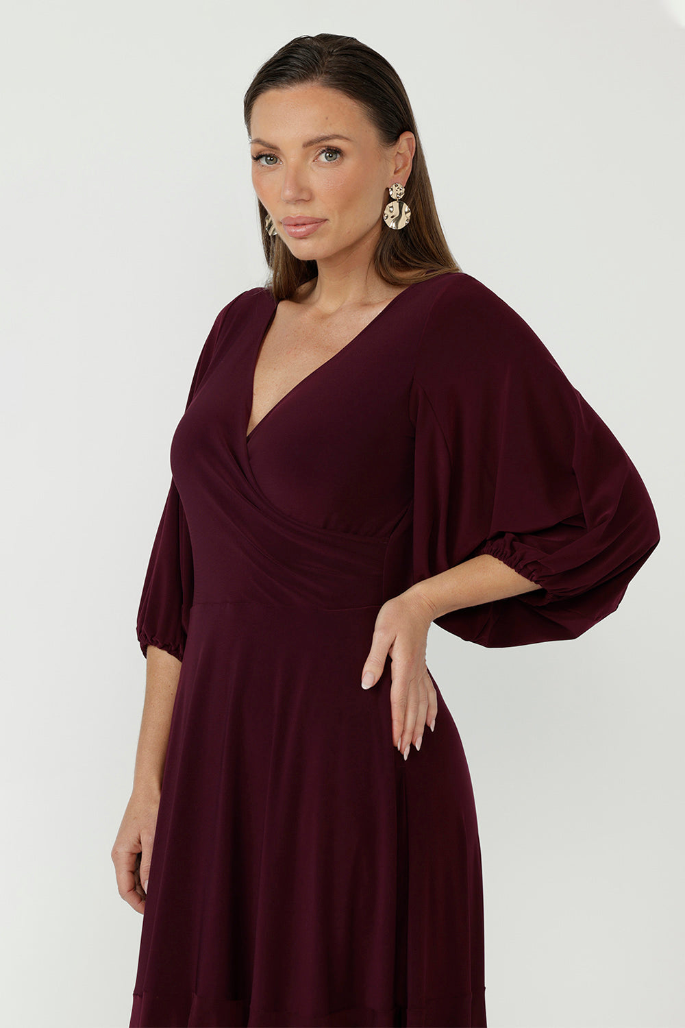 Elegant Helena Maxi Dress crafted from luxe dry-touch jersey, featuring voluminous lantern sleeves, a flattering V-neckline and practical side pockets.