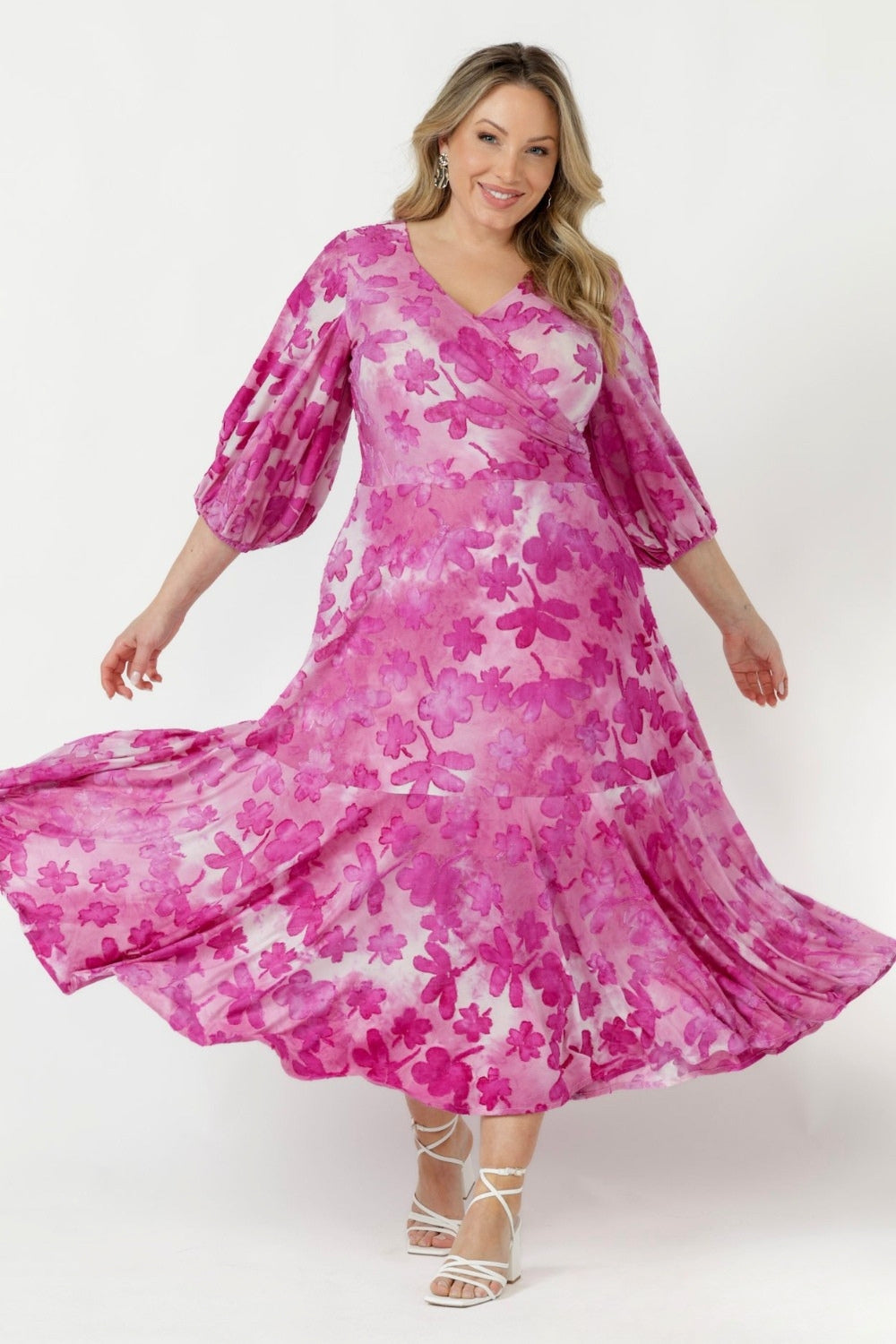 Women’s Helena Dress crafted from soft stretch textured burnout fabric with a double-layer back bodice, lined skirt, side pockets and graceful ruffle detailing.